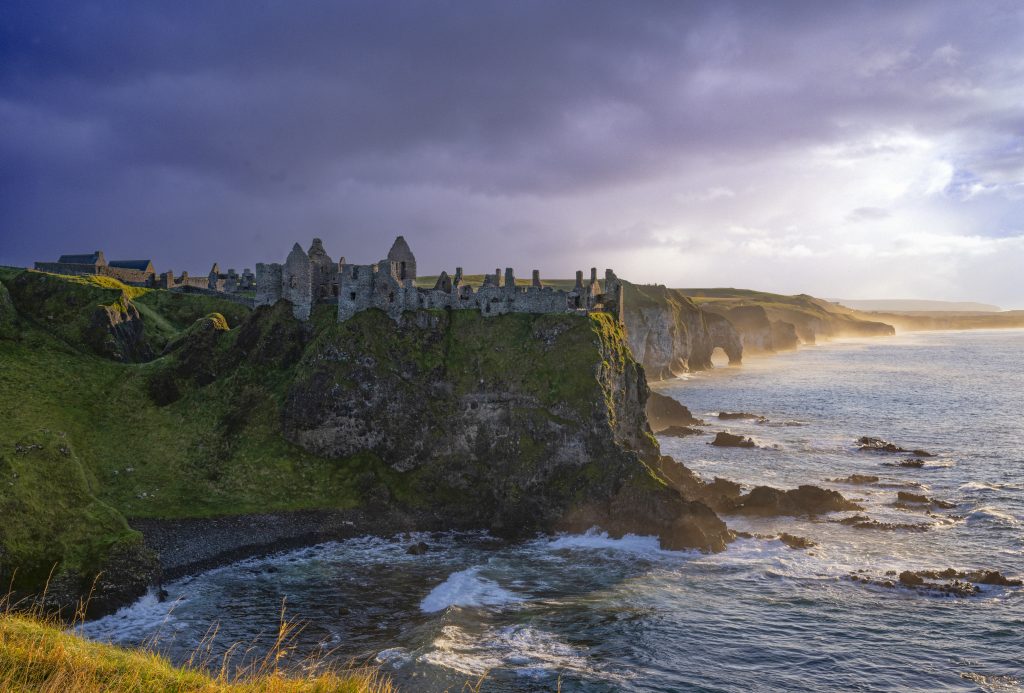 Modern coastal view of Dunluce Castle